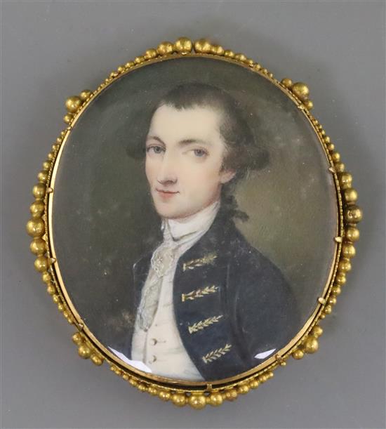 18th century English School Miniature portrait of a gentleman wearing a blue coat 1.5 x 1.25in., gold brooch frame